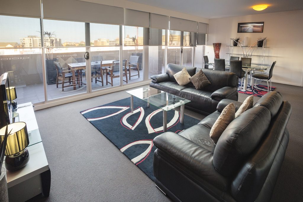 Home - honeysuckle executive apartments living room